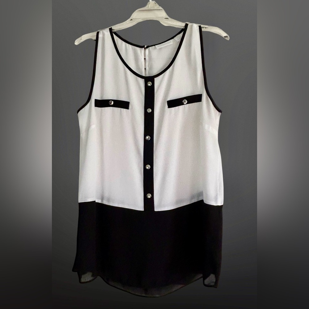 Black and white sleeveless chiffon top; M; new in package. Silver button detail